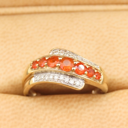 286 - Tangerine Garnet and Diamond Set Wrap Around Design Ring Mounted on 9 Carat Yellow Band Size Q