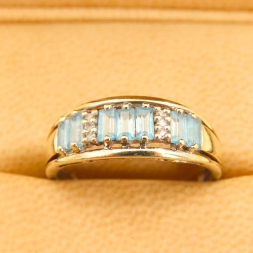 291 - Seven Stone Baguette Cut Aquamarine Ring with Diamond Insets Mounted on 9 Carat Yellow Gold Band Siz... 