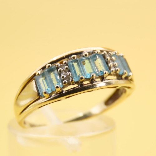 291 - Seven Stone Baguette Cut Aquamarine Ring with Diamond Insets Mounted on 9 Carat Yellow Gold Band Siz... 