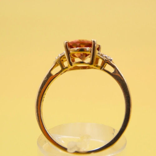 293 - Pink Garnet Solitaire Ring Further Set with Diamonds to Shoulders Mounted on 9 Carat Yellow Gold Ban... 