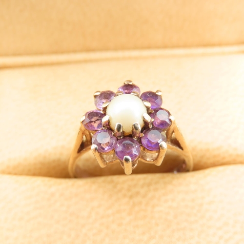 299 - Amethyst and Pearl Flower Motif Ring Mounted on 9 Carat Yellow Gold Band Size M