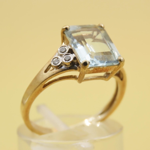 305 - Aquamarine and Diamond Ring Mounted on 9 Carat Yellow Gold Band Size N