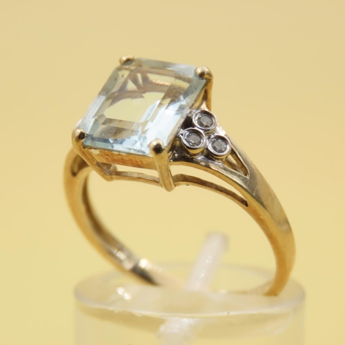 305 - Aquamarine and Diamond Ring Mounted on 9 Carat Yellow Gold Band Size N