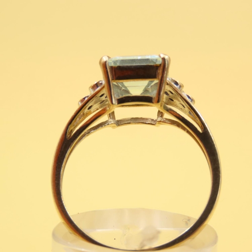 305 - Aquamarine and Diamond Ring Mounted on 9 Carat Yellow Gold Band Size N