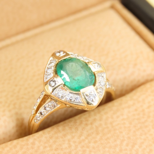 307 - Emerald and Diamond Ladies Cluster Ring Mounted on 18 Carat Gold Band