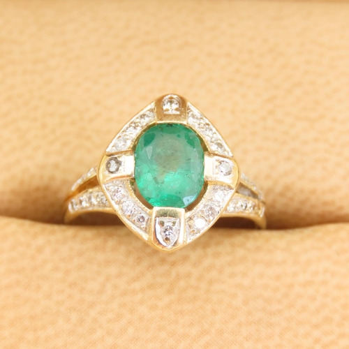 307 - Emerald and Diamond Ladies Cluster Ring Mounted on 18 Carat Gold Band