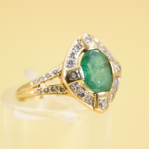 307 - Emerald and Diamond Ladies Cluster Ring Mounted on 18 Carat Gold Band