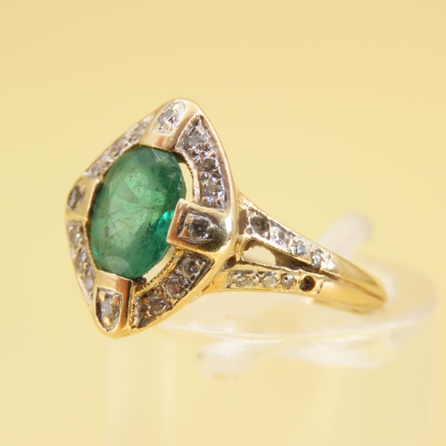 307 - Emerald and Diamond Ladies Cluster Ring Mounted on 18 Carat Gold Band