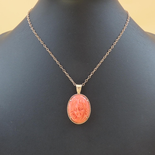 308 - 18 Carat Yellow Gold Mounted Pendant Red Coral Carved Classical Profile 3cm High Further Set on 9 Ca... 