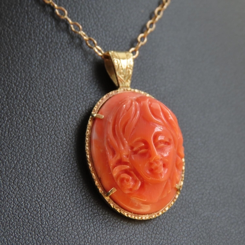 308 - 18 Carat Yellow Gold Mounted Pendant Red Coral Carved Classical Profile 3cm High Further Set on 9 Ca... 