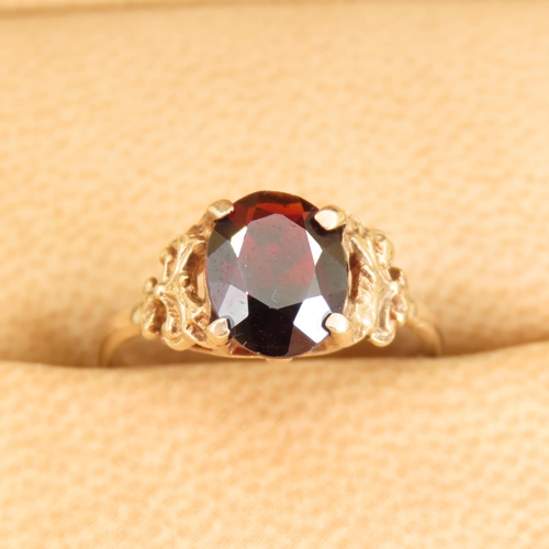 309 - Red Garnet Centerstone Ring Four Claw Set Mounted on 9 Carat Yellow Gold Band Size L