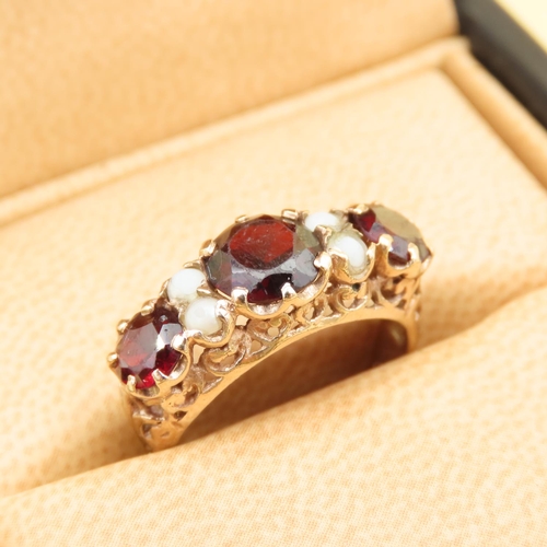 31 - Red Garnet and Seed Pearl Ring Mounted on 9 Carat Yellow Gold Band Size K