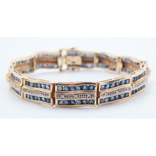 334 - Attractively Detailed Three Row Sapphire and Diamond Ladies Bracelet Mounted on 14 Carat Yellow Gold... 