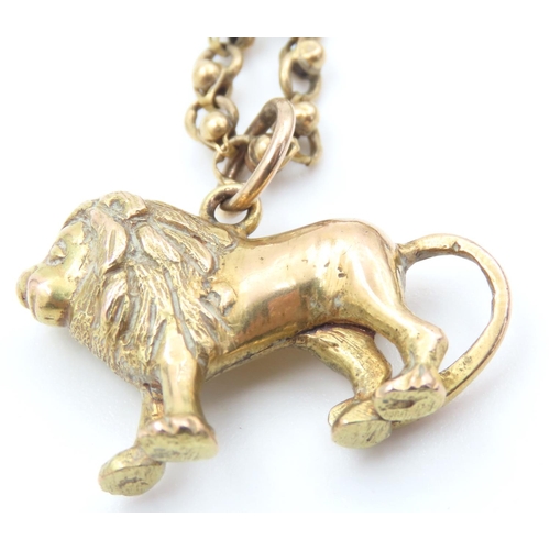 335 - 18 Carat Yellow Gold Three Strand T-Bar Clasp Drape Form Necklace  with Lion Motif Charm Finely Deta... 