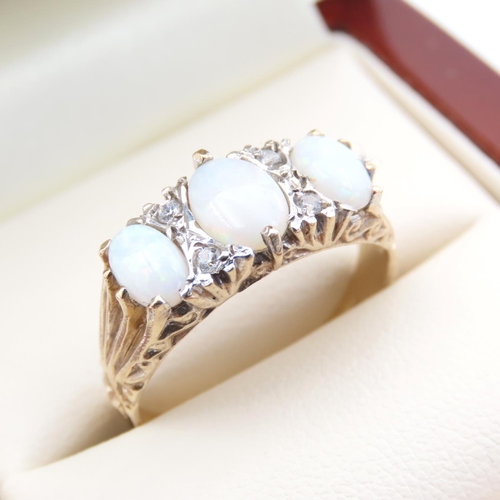 345 - Three Stone Opal and Diamond Set Ladies Ring Mounted on 9 Carat Yellow Gold Ring Size Q