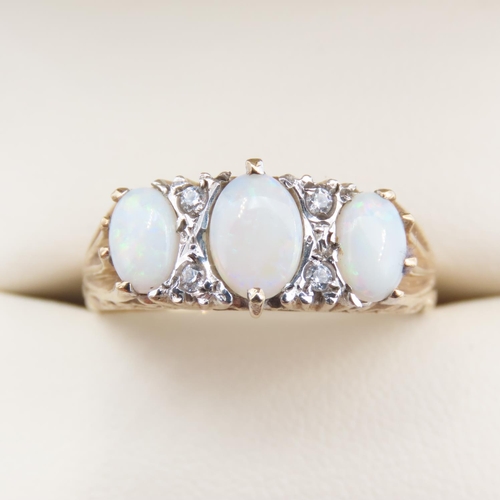 345 - Three Stone Opal and Diamond Set Ladies Ring Mounted on 9 Carat Yellow Gold Ring Size Q