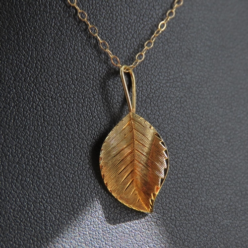 354 - Leaf Motif 9 Carat Yellow Gold Pendant 2cm High Mounted on 9 Carat Yellow Gold Chain 46cm Long