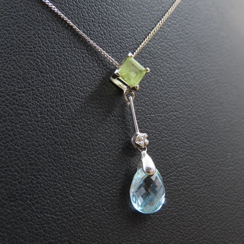 384 - Blue Topaz Peridot and Diamond Set Pendant 9 Carat Yellow Gold Pendant 3cm High Mounted on 9 Carat W... 