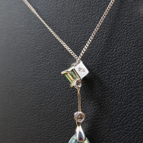 384 - Blue Topaz Peridot and Diamond Set Pendant 9 Carat Yellow Gold Pendant 3cm High Mounted on 9 Carat W... 