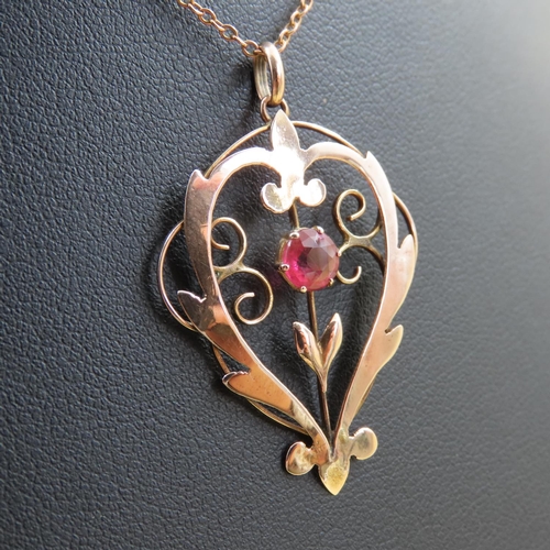 386 - Ruby Inset 9 Carat Rose Gold Pendant 4cm High Further Set on 9 Carat Rose Gold Chain 36cm Long