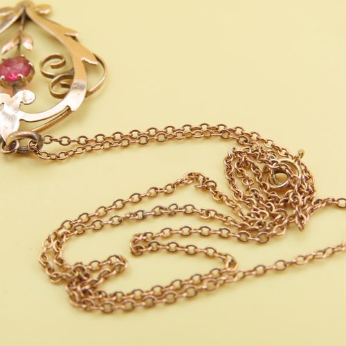 386 - Ruby Inset 9 Carat Rose Gold Pendant 4cm High Further Set on 9 Carat Rose Gold Chain 36cm Long