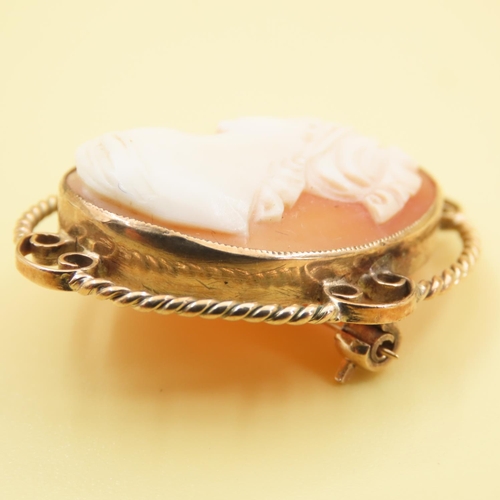 395 - 9 Carat Yellow Gold Mounted Cameo Brooch 4cm High with Shaped Form Surround