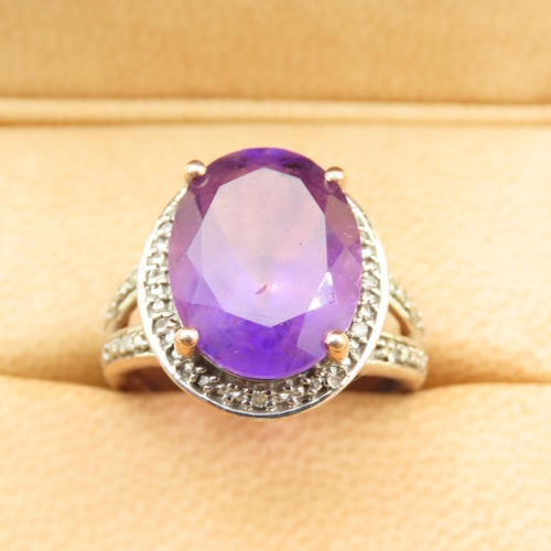 411 - Amethyst and Diamond Centerstone Ring Four Claw Set Further Diamonds to Shoulders Mounted on 9 Carat... 