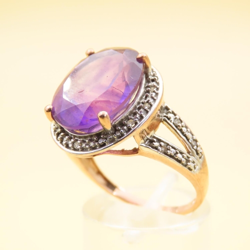 411 - Amethyst and Diamond Centerstone Ring Four Claw Set Further Diamonds to Shoulders Mounted on 9 Carat... 