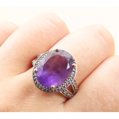 411 - Amethyst and Diamond Centerstone Ring Four Claw Set Further Diamonds to Shoulders Mounted on 9 Carat... 