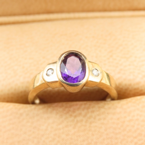 412 - Oval Cut Amethyst Set Centre Stone Ring with Diamond Set Shoulders Mounted on 9 Carat Yellow Gold Ba... 