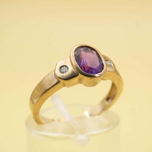 412 - Oval Cut Amethyst Set Centre Stone Ring with Diamond Set Shoulders Mounted on 9 Carat Yellow Gold Ba... 