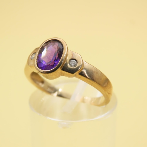 412 - Oval Cut Amethyst Set Centre Stone Ring with Diamond Set Shoulders Mounted on 9 Carat Yellow Gold Ba... 