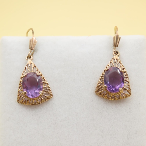 413 - Pair of Amethyst Drop Earrings Mounted on 9 Carat Yellow Gold Attractively Detailed Each 3cm Drop