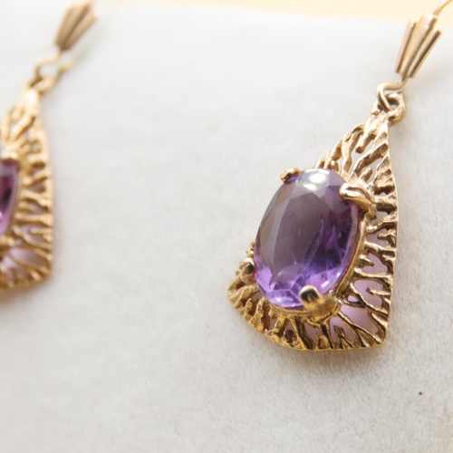 413 - Pair of Amethyst Drop Earrings Mounted on 9 Carat Yellow Gold Attractively Detailed Each 3cm Drop