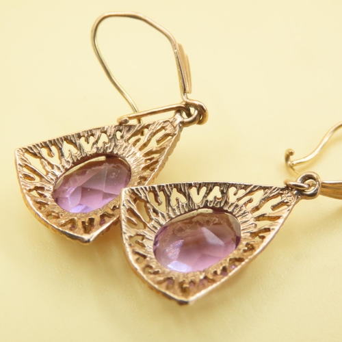 413 - Pair of Amethyst Drop Earrings Mounted on 9 Carat Yellow Gold Attractively Detailed Each 3cm Drop