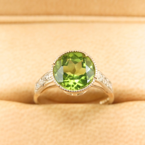 416 - Peridot and Diamond Set Ladies Ring Mounted on 9 Carat Yellow Gold Band Attractively Detailed Ring S... 