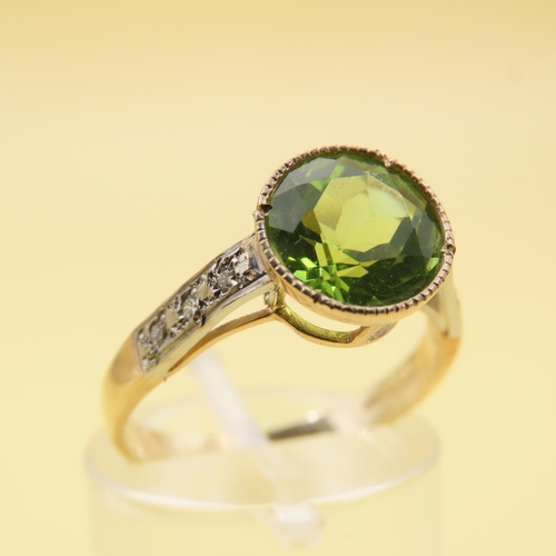 416 - Peridot and Diamond Set Ladies Ring Mounted on 9 Carat Yellow Gold Band Attractively Detailed Ring S... 