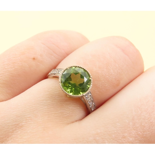 416 - Peridot and Diamond Set Ladies Ring Mounted on 9 Carat Yellow Gold Band Attractively Detailed Ring S... 