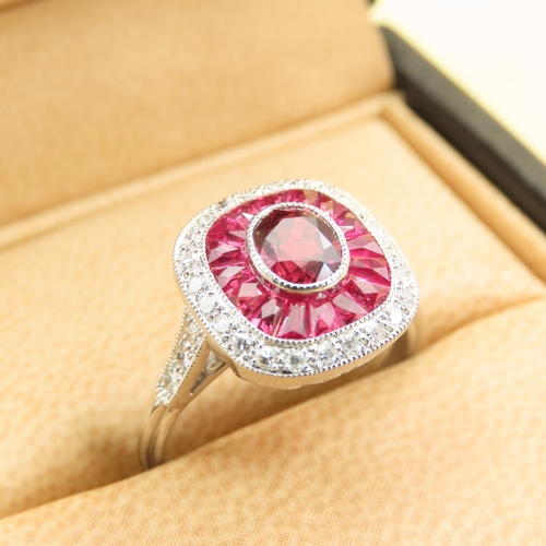 423 - Ruby and Diamond Panel Set Ladies Ring Mounted on Platinum Band Size M and a Half