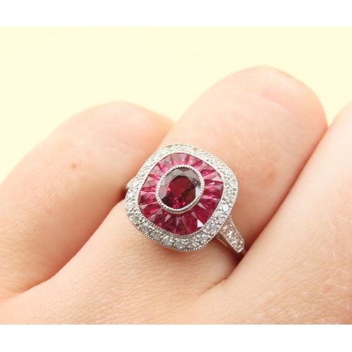 423 - Ruby and Diamond Panel Set Ladies Ring Mounted on Platinum Band Size M and a Half