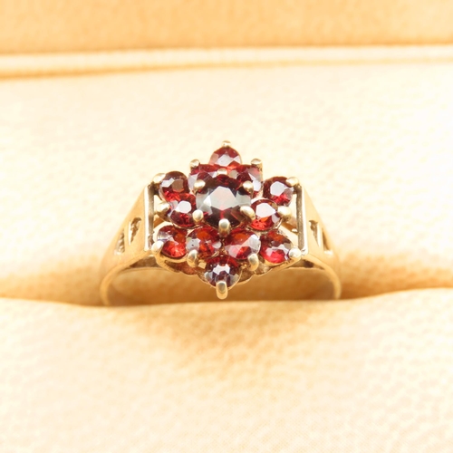 427 - Garnet Cluster Ring Mounted on 9 Carat Yellow Gold Band Ring Size O