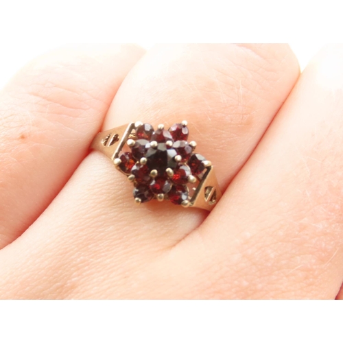 427 - Garnet Cluster Ring Mounted on 9 Carat Yellow Gold Band Ring Size O