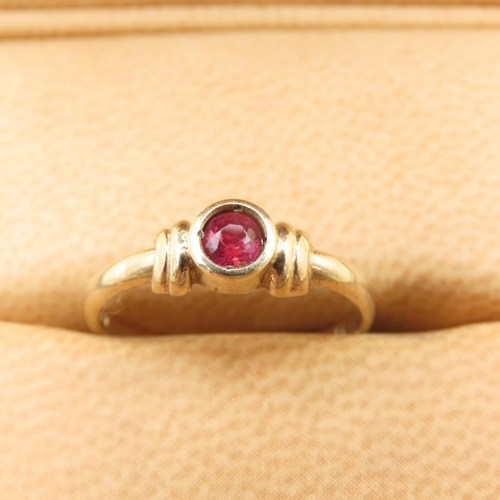 429 - Ruby Centerstone Ring Rubover Set Mounted on 9 Carat Yellow Gold Band Size L