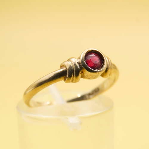 429 - Ruby Centerstone Ring Rubover Set Mounted on 9 Carat Yellow Gold Band Size L