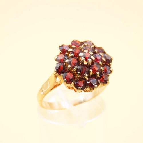 433 - Garnet Set Cluster Ring Mounted on 9 Carat Yellow Gold Band Size P