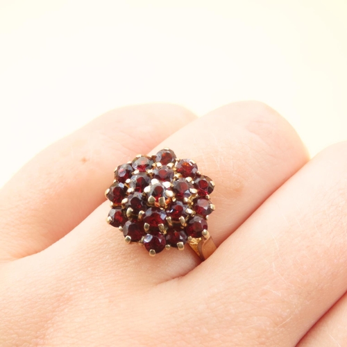 433 - Garnet Set Cluster Ring Mounted on 9 Carat Yellow Gold Band Size P