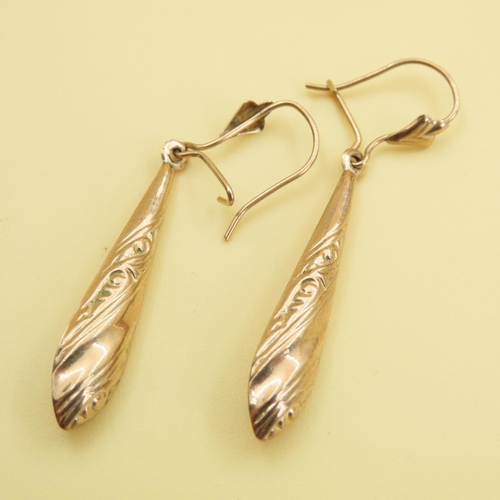 445 - Pair of 9 Carat Yellow Gold Drop Earrings Incised Decoration Each 4cm Drop