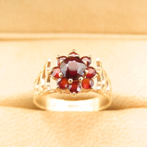 447 - Red Garnet Set Cluster Ring Mounted on 9 Carat Yellow Gold Band Size L