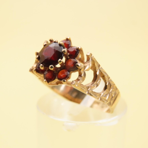 447 - Red Garnet Set Cluster Ring Mounted on 9 Carat Yellow Gold Band Size L