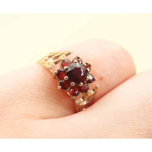 447 - Red Garnet Set Cluster Ring Mounted on 9 Carat Yellow Gold Band Size L